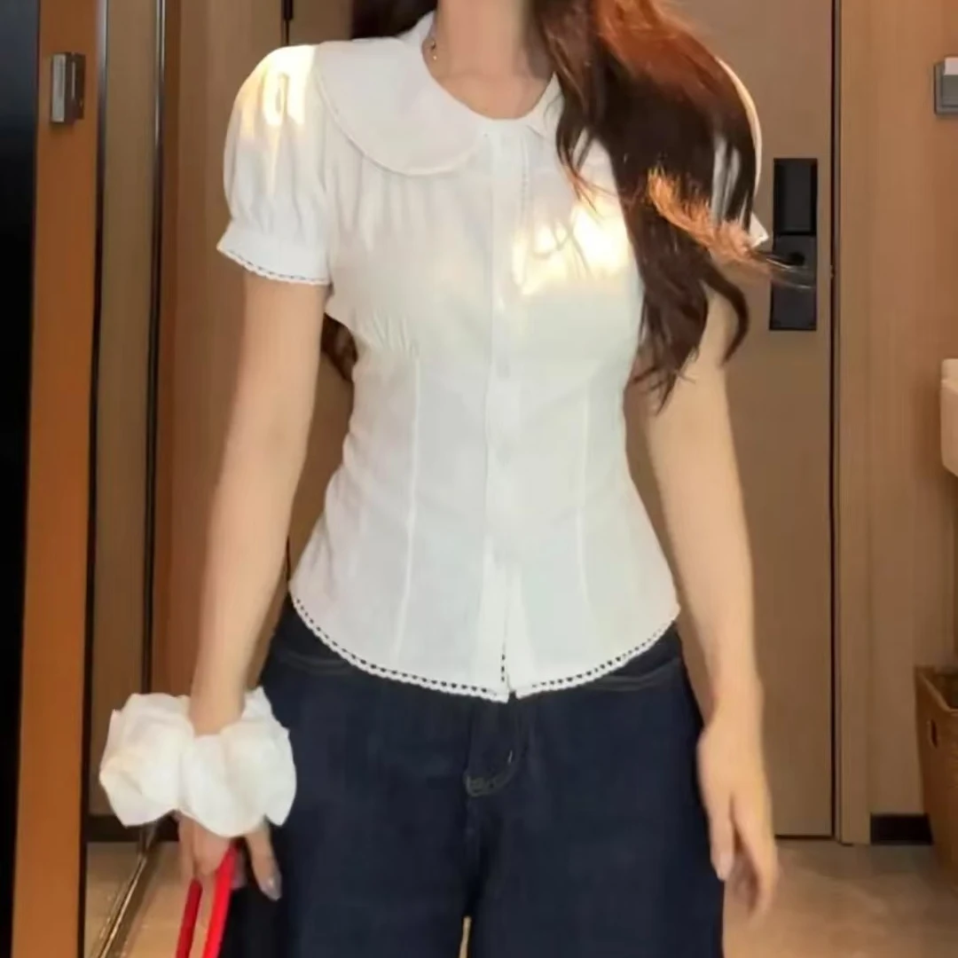 白色娃娃领短袖衬衫女2025夏季新款设计感泡泡袖收腰显瘦短款衬衣