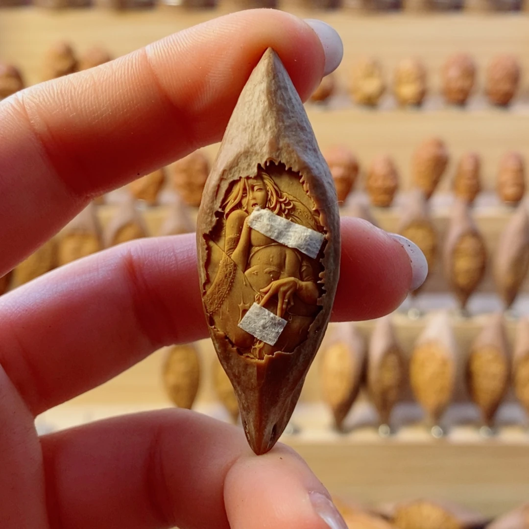 吱***d手串/手链橄榄核原皮美女