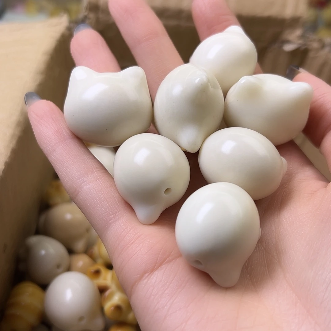 菩提根/象牙果吊坠瑕疵牙果白猫头10颗卡25➕