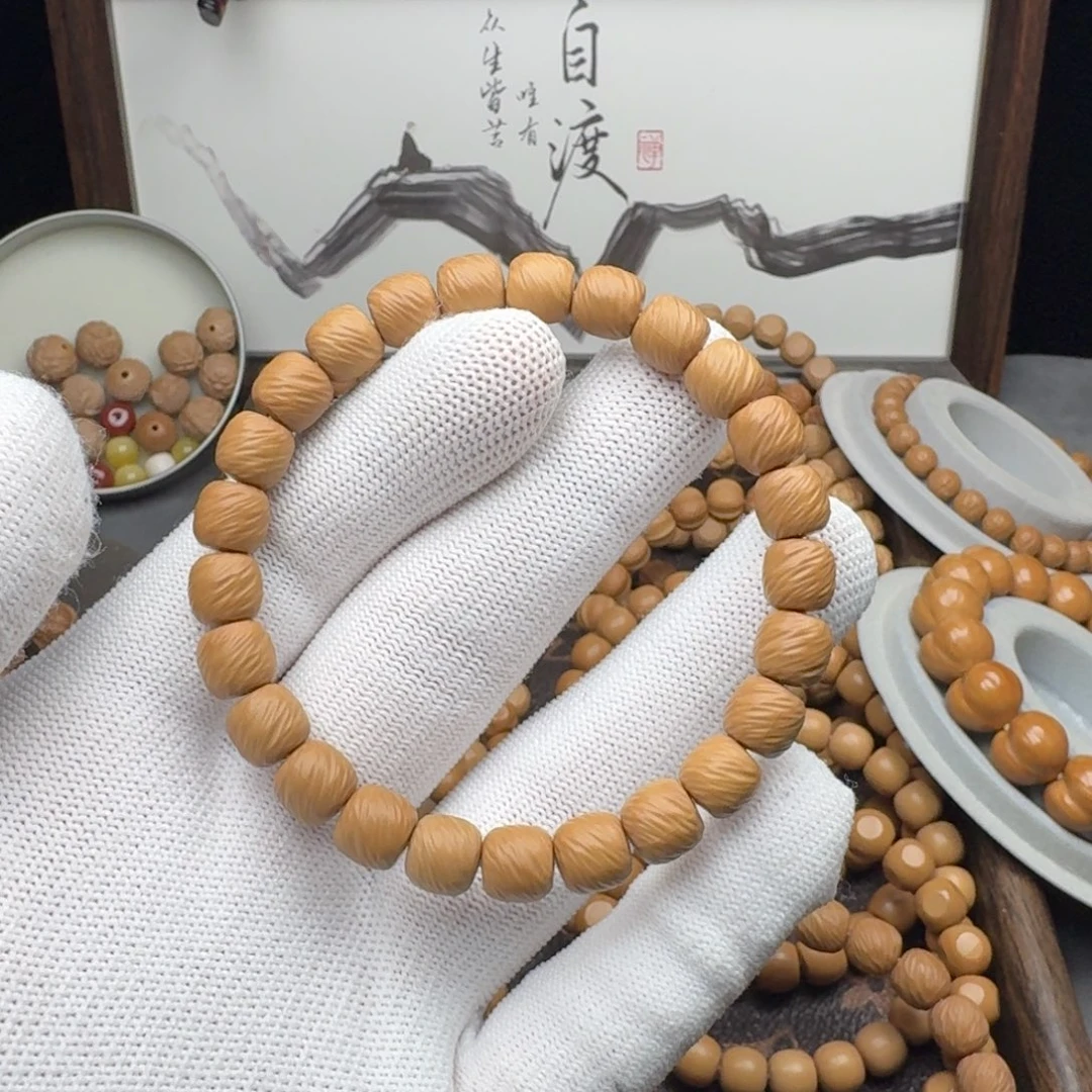 小***_猴头核桃吊坠道珠云锦