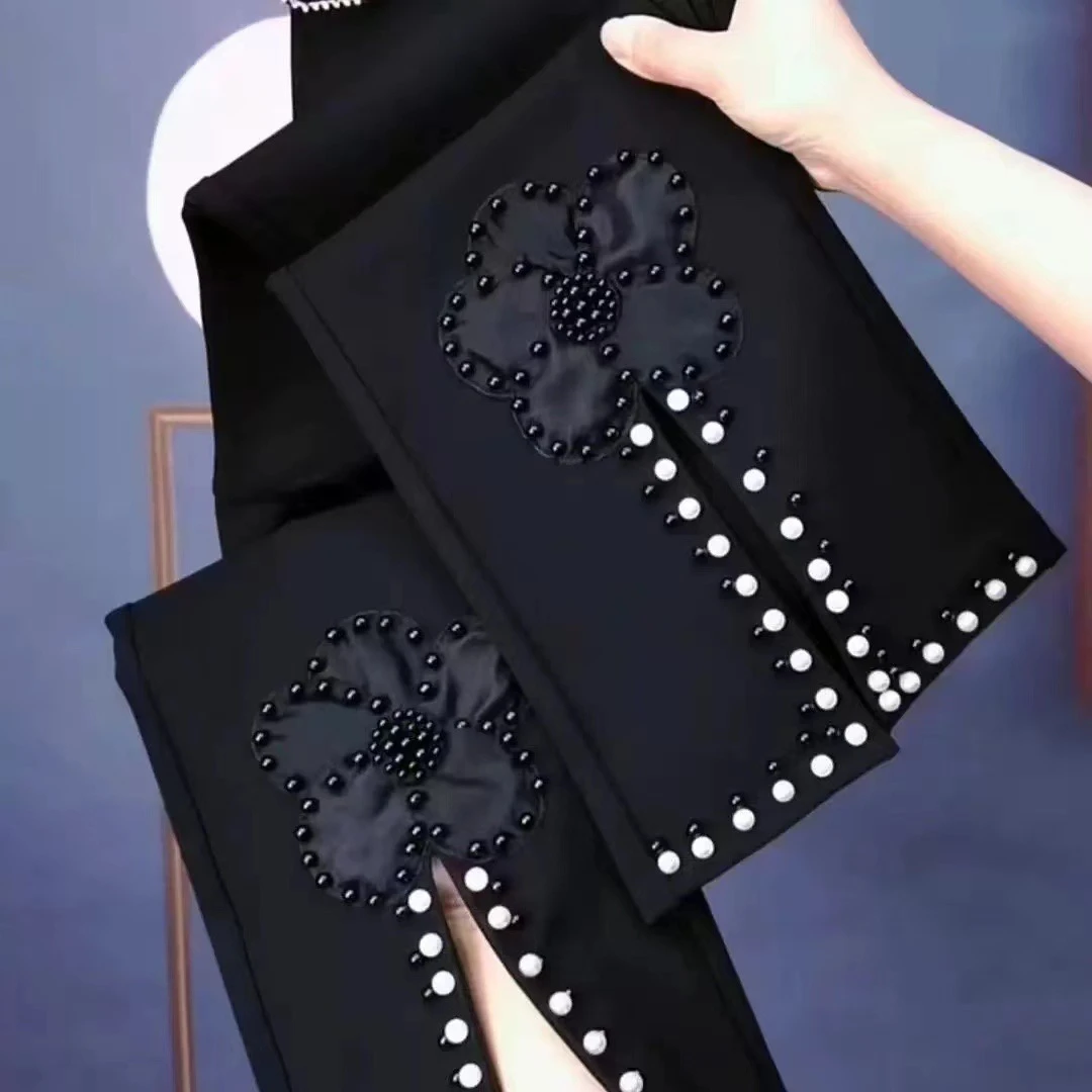 花朵重工纯色显瘦弹力微喇裤1018