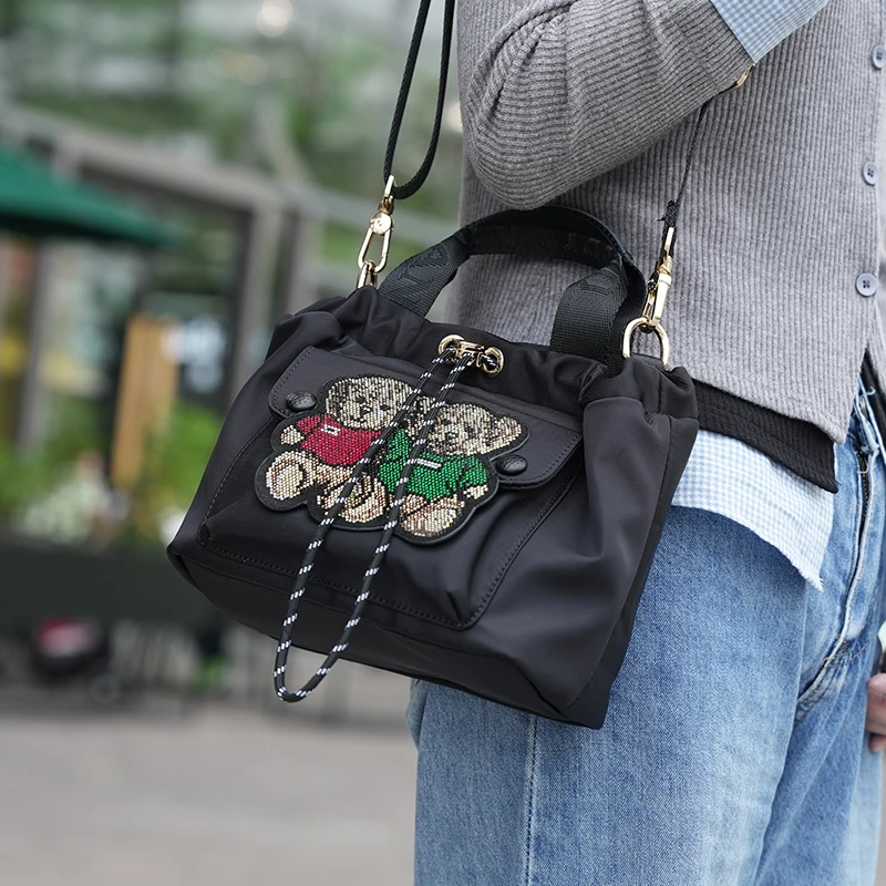 GELANDAI2025年新款抽带两只小熊单肩斜挎包时尚百搭个性1931