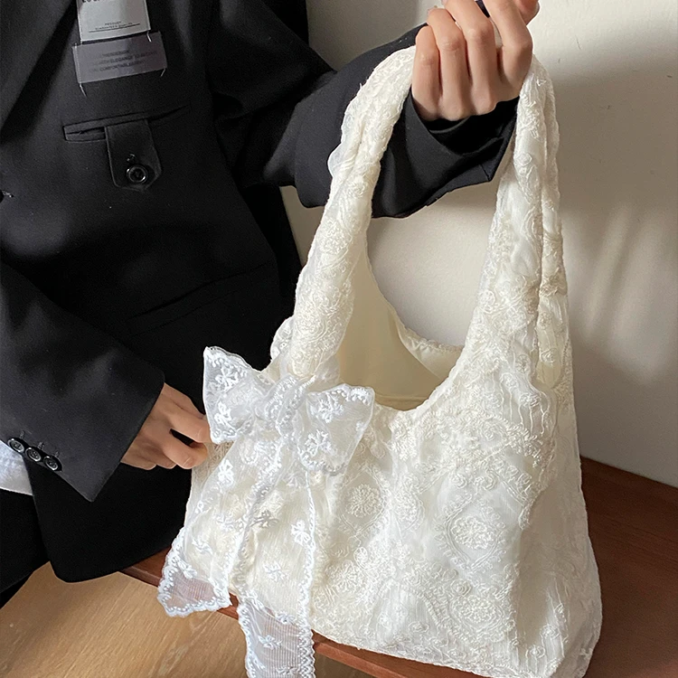 韩系慵懒风蕾丝花朵帆布包女2025新款大容量上班通勤手提腋下包LX