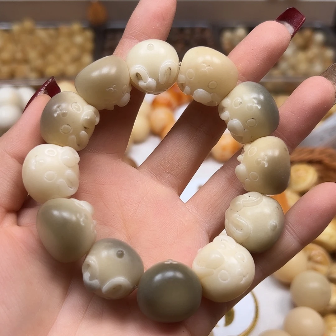 手串菩提根/象牙果瑕疵兔子1条有裂