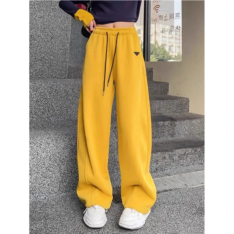 拉夏贝尔黄色阔腿休闲卫裤女2025春秋季新款宽松抽绳垂感香蕉长裤