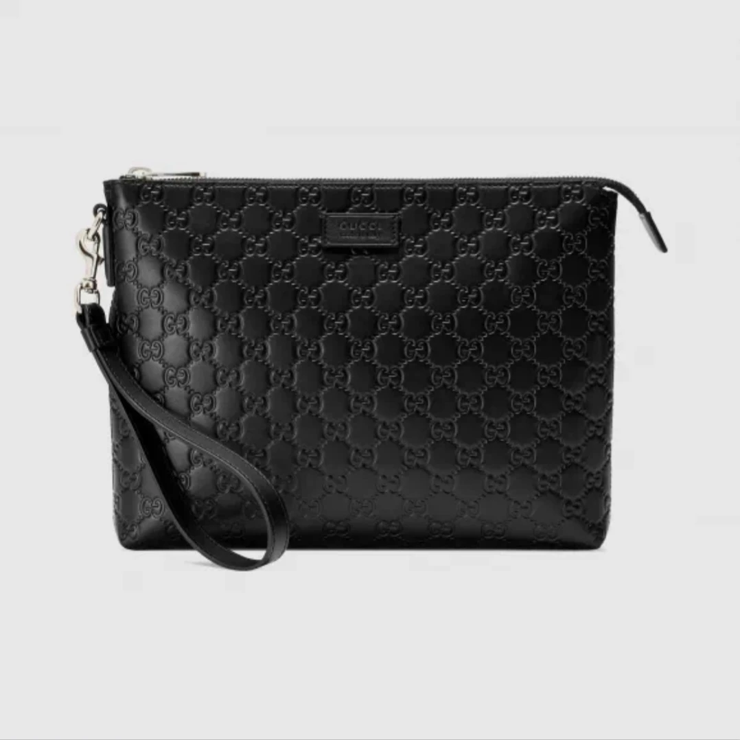 95新 GUCCI/古驰 97新皮压花手包