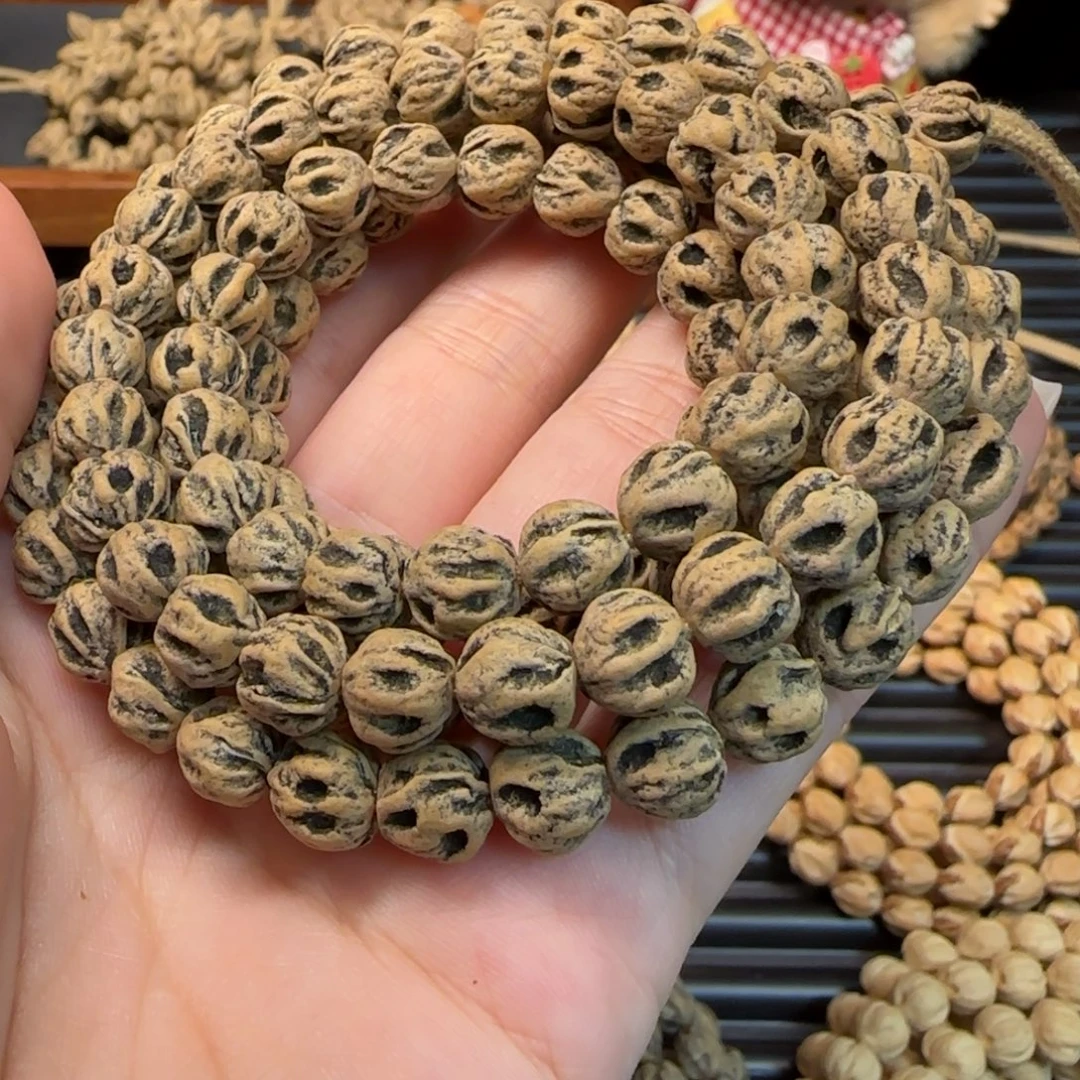 爱***己柏香籽/百香籽吊坠