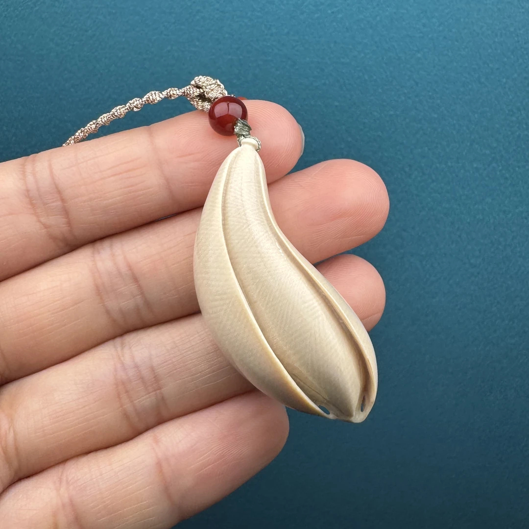 H3006天然猛犸牙 玉兰花雕刻件 19*44mm支持鉴定 假一罚四