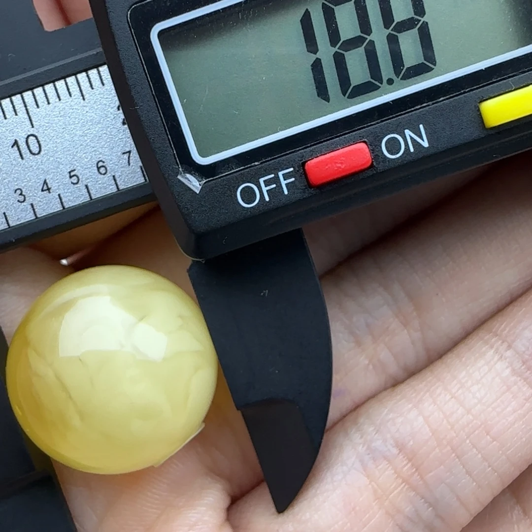 程***臭蜜蜡未镶嵌裸石微瑕飘花圆珠