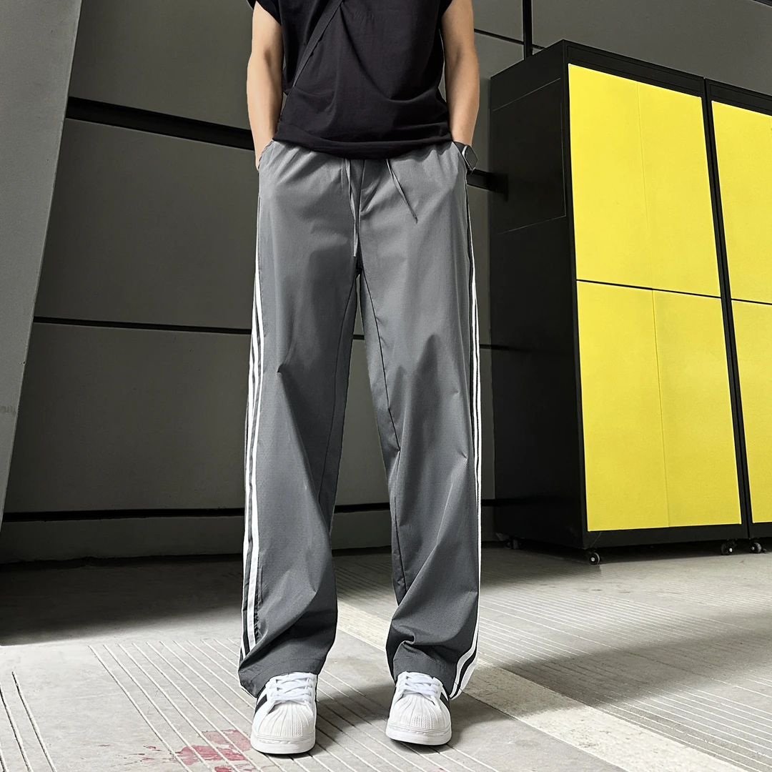 QUALCOMM灰色宽松潮流三条杠运动裤男夏季激光打孔透气直筒休闲裤