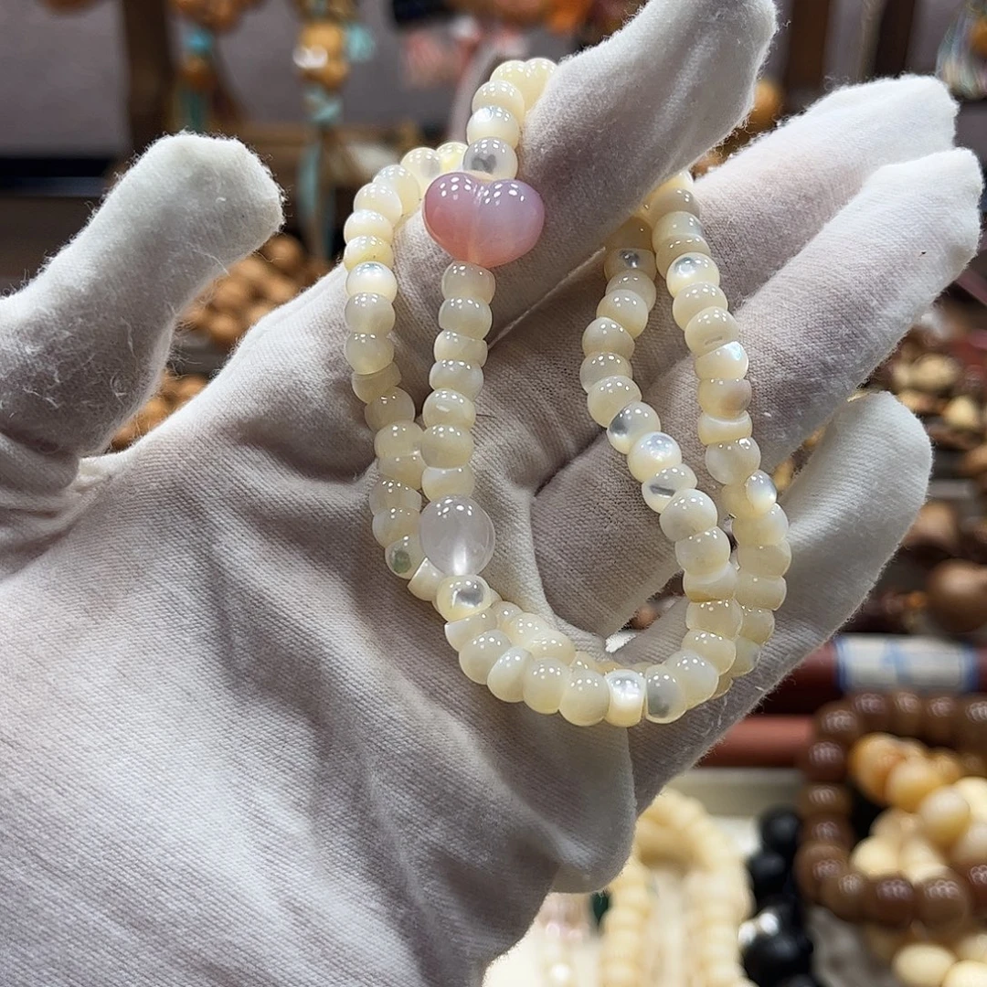 招***⁹猴头核桃吊坠鱼骨双圈diy手串