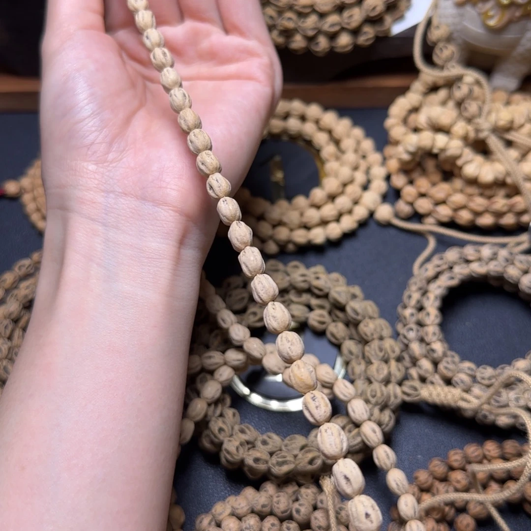 亮***剑柏香籽/百香籽吊坠