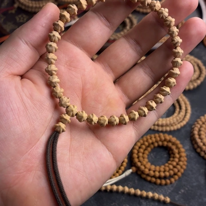 柏香籽/百香籽手串热振梅花原桩横打