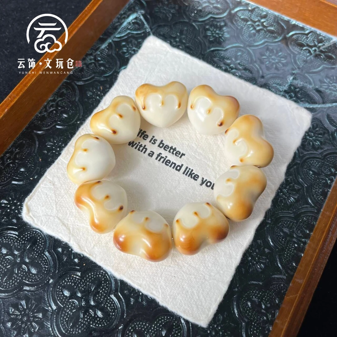 【心芽初暖26mm】象牙果炭烤横孔蜂蜜爱心CP111-1026