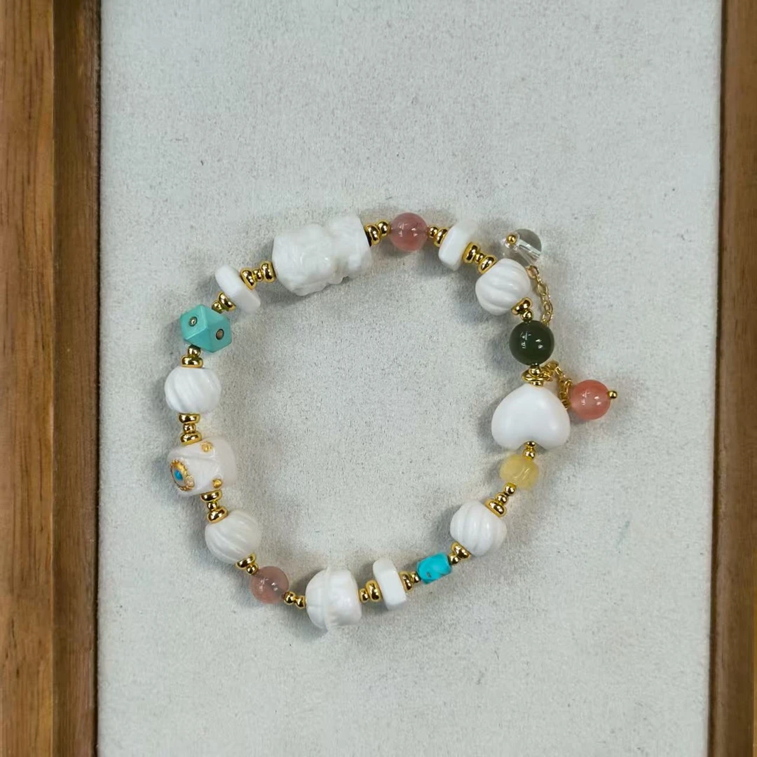 骨骨和田蜜蜡多宝手串