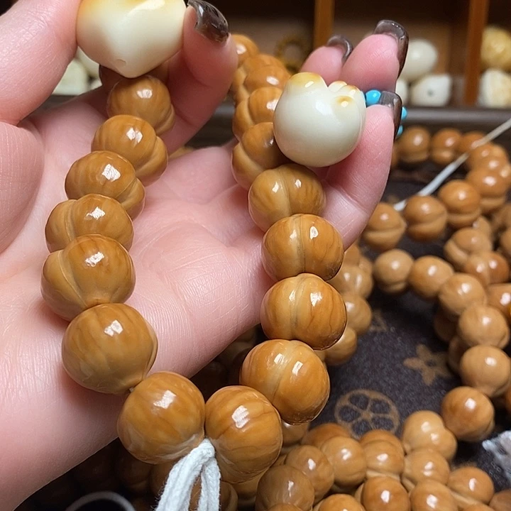 冰***点手串猴头核桃爱心牙果 猫爪牙果滴流 蕾丝蝴蝶结
