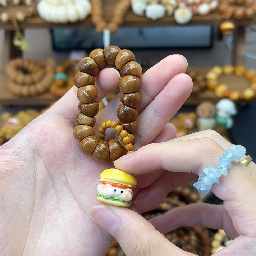 库克手串活****彤手捻汉堡猪