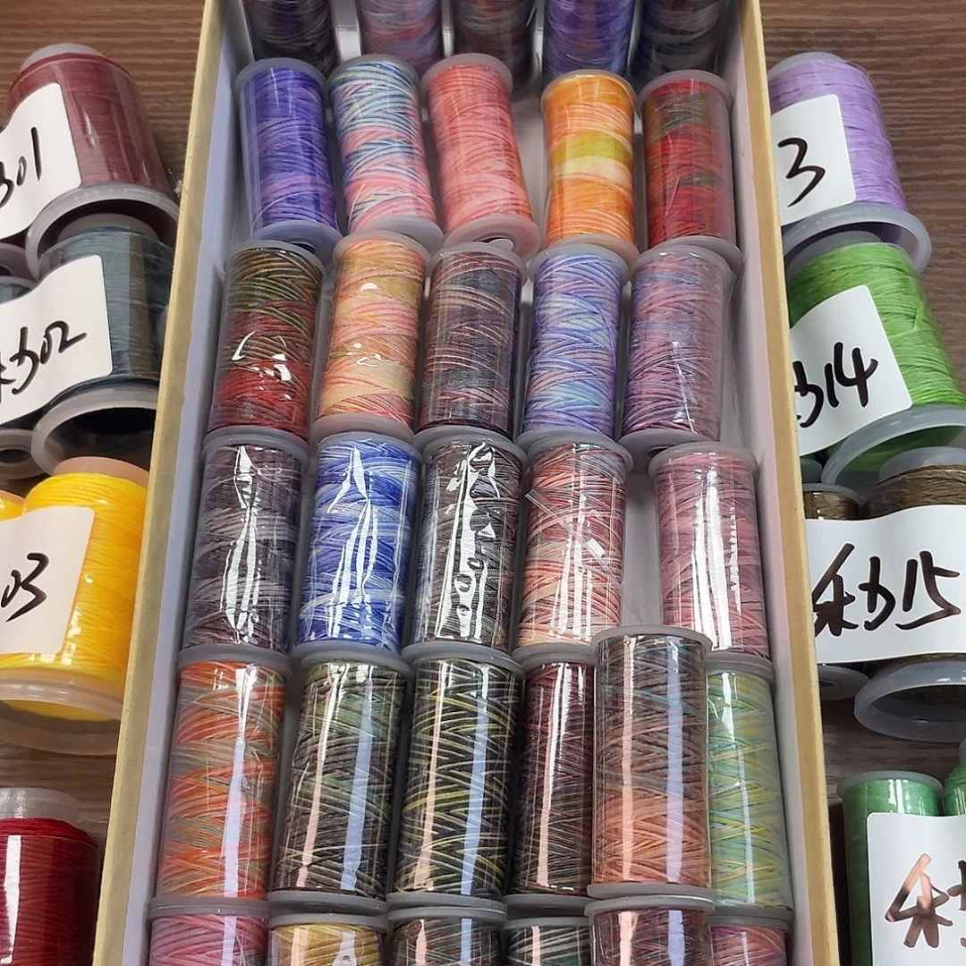 狒***e聚酯纤维0.2mm12克段染泰蜡32色