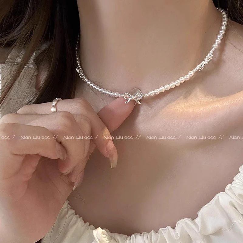 铜合金项链 蝴蝶结仿珍珠项链配饰女轻奢高级感choker锁骨链颈链