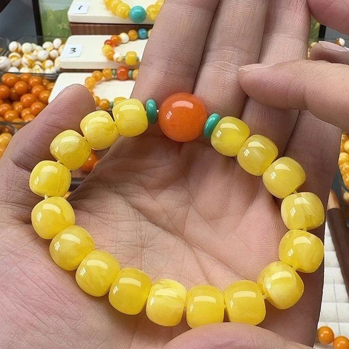 s****非金属鸡油黄色桶珠一条