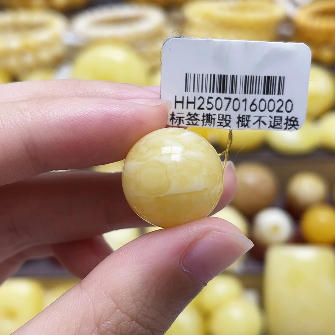 裸石琥珀未镶嵌16.7mm浓蜡妖白花圆珠.瑕皮色
