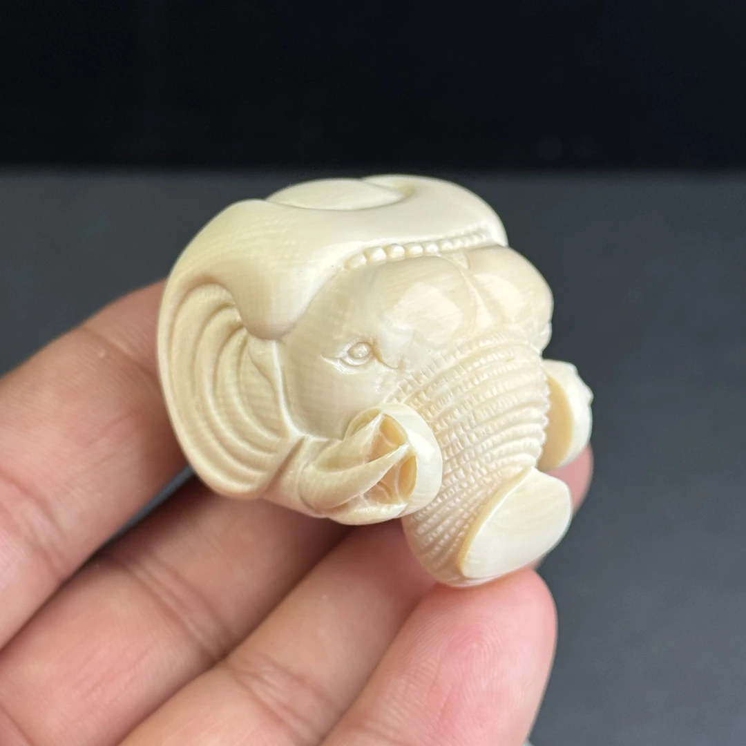 H88-13天然猛犸牙雕刻象神把件 33x43x32mm 43克