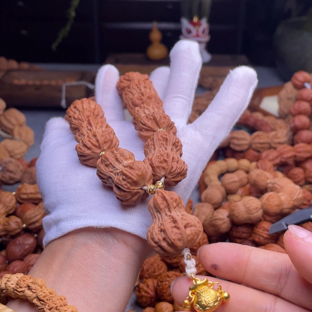 孙***e手串文玩核桃秋子