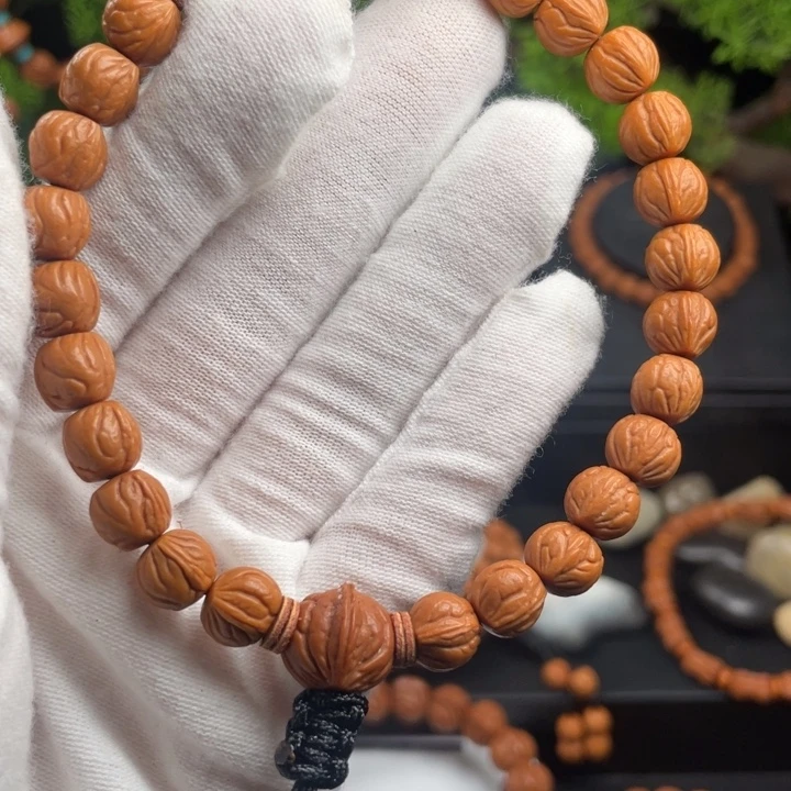 爱***满桃核吊坠精品玉龙脊