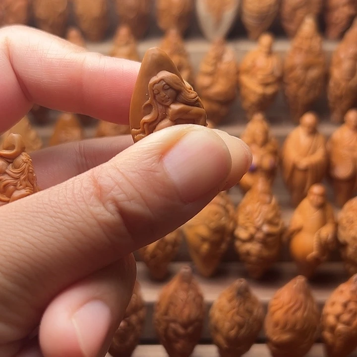 贾***斌橄榄核吊坠橄榄菜