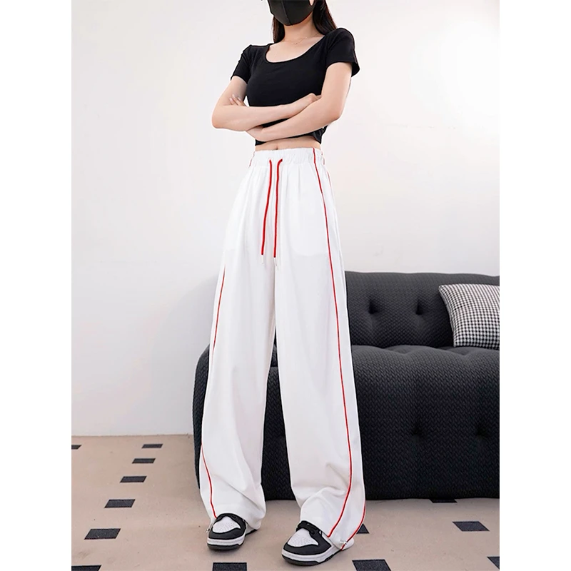 时尚弯刀裤女2025夏季新款宽松设计感宽松条纹拼接休闲阔腿裤长裤