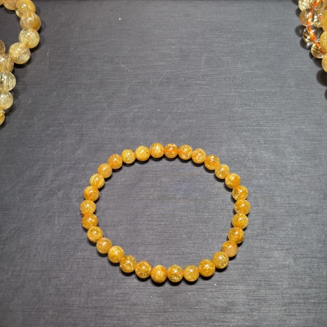 7***n未镶嵌水晶手串金钛晶