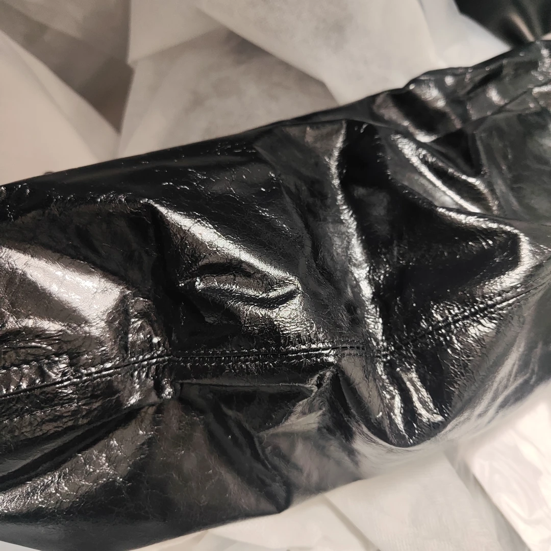 纸皮牛角头层牛皮斜挎包松驰感女包