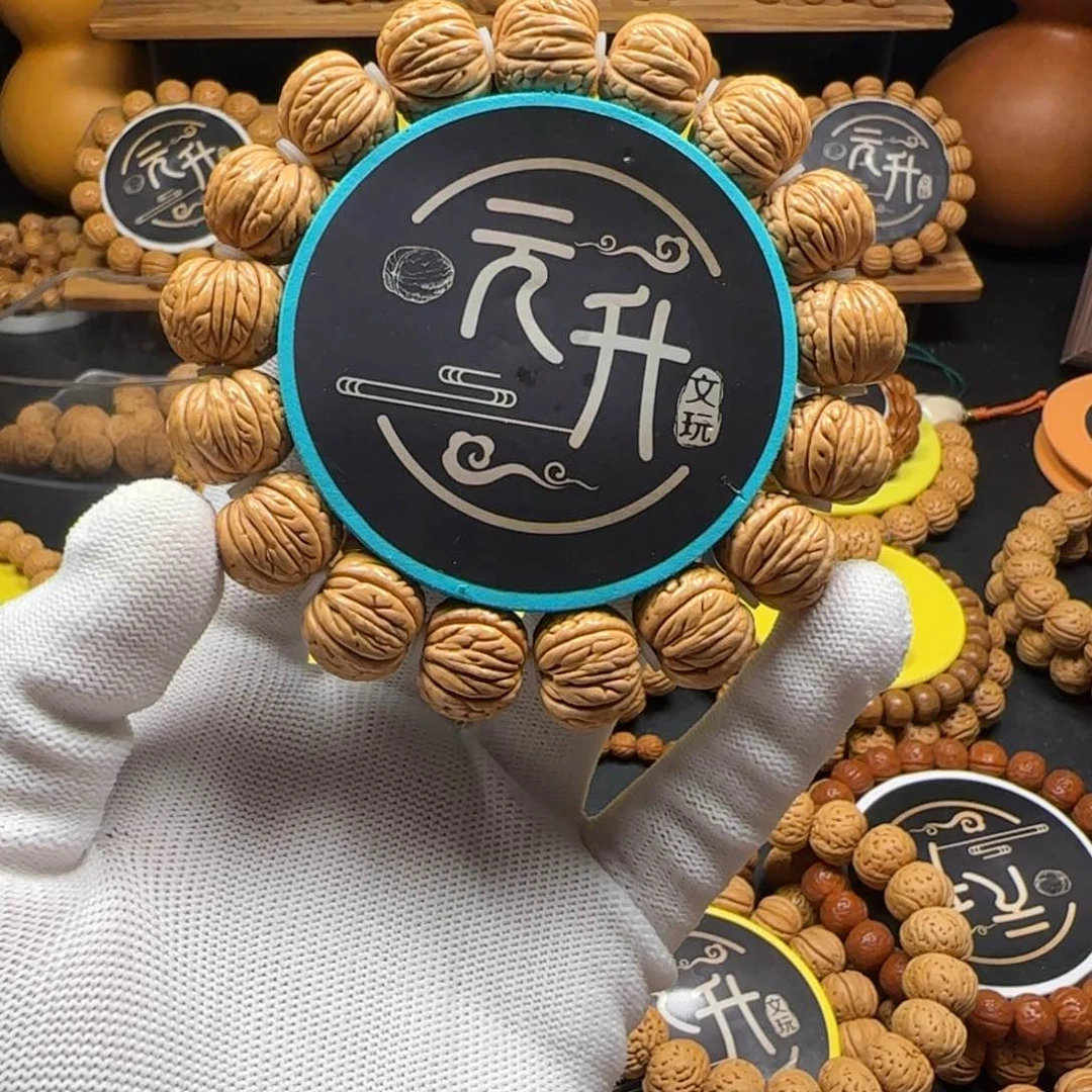 墨***、桃核手串桃核手串