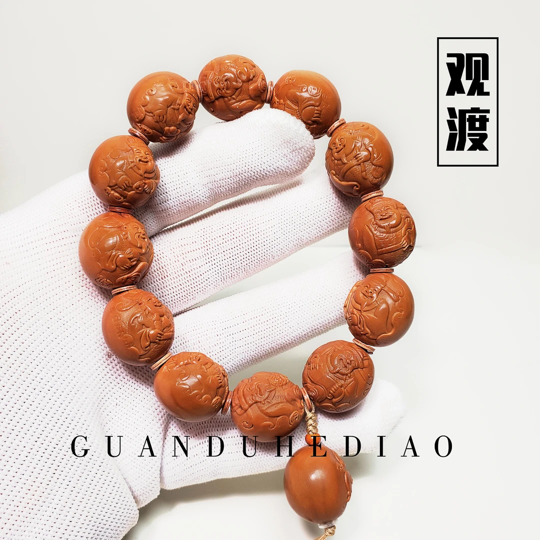 观渡-【正圆浮雕财神】橄榄核红油核雕刻官帽财神