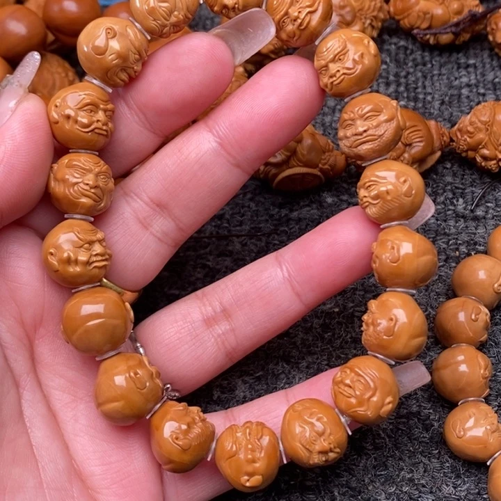 吊坠橄榄核哦啦啦啦噜啦啦啦健健康康