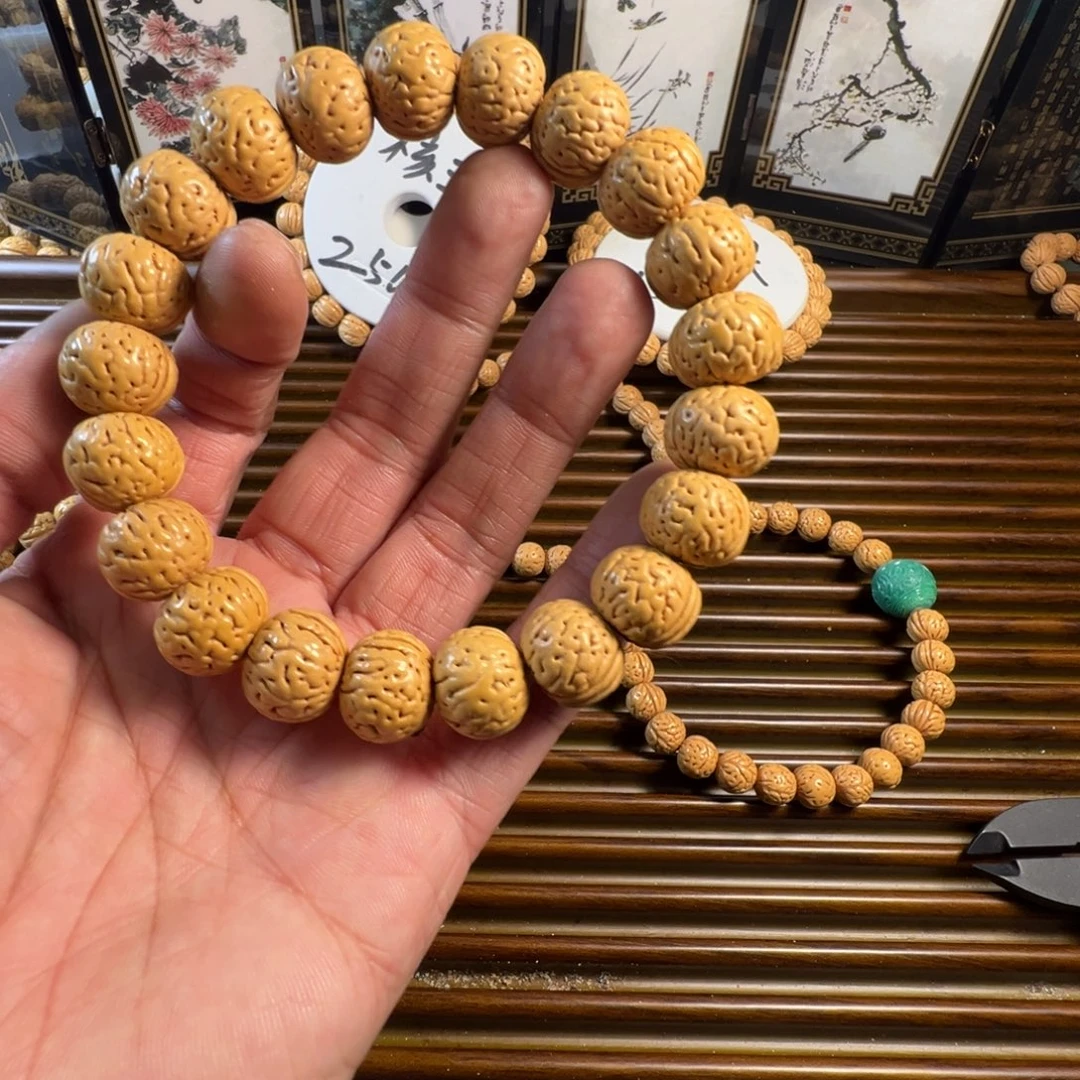 三***七桃木奶油金丹桃核手串