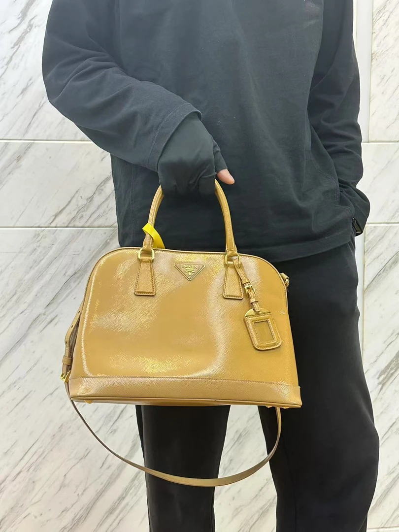 95新 Prada/普拉达 姜黄色亮面贝壳/云海优选/H03964