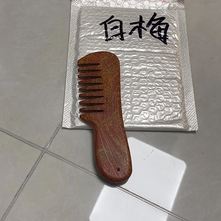 白*泗水砭石刮痧方法