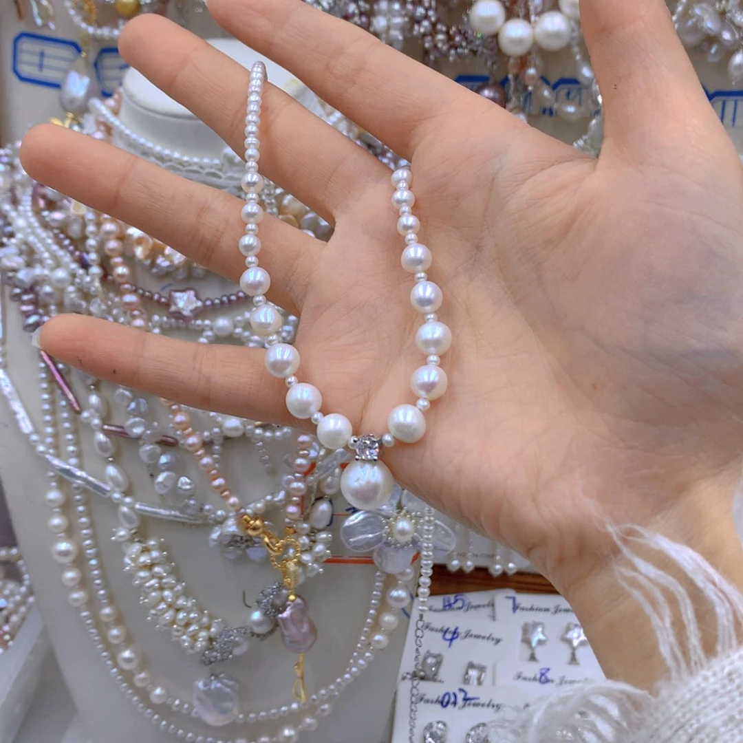 淡水珍珠耳饰银S925镶嵌佩****e