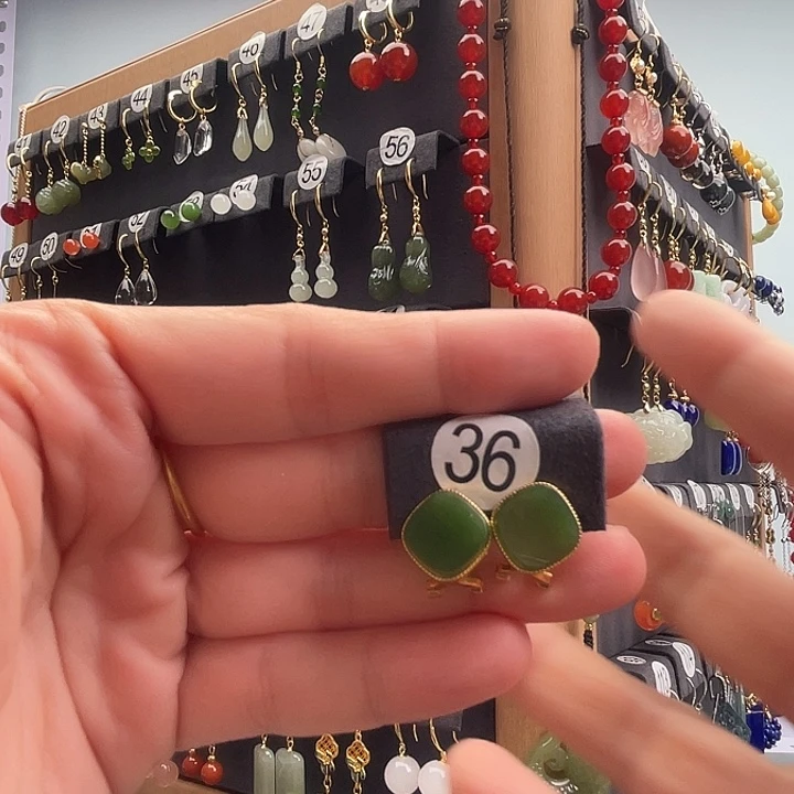 郁***姐和田玉银S925镶嵌耳饰