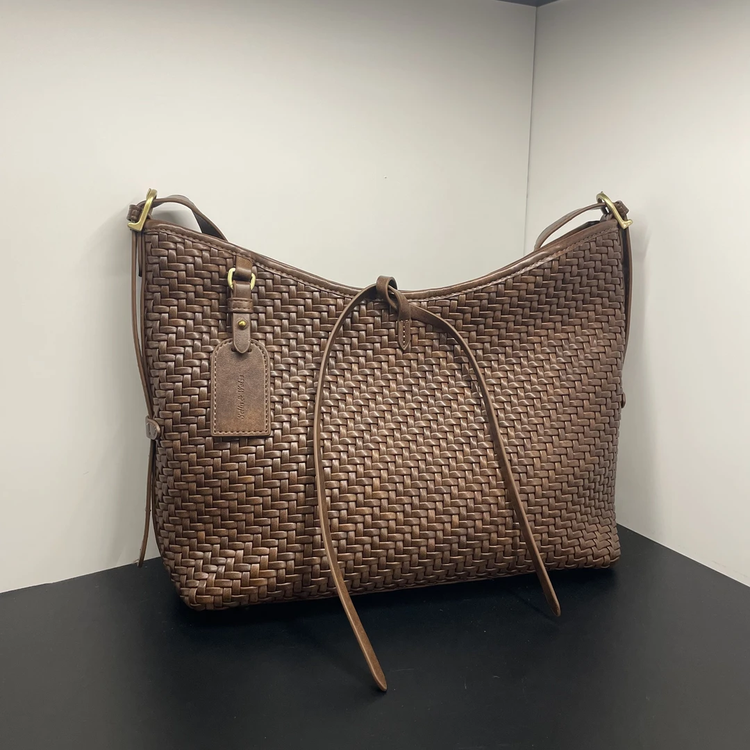 25年新款轻奢编织休闲时尚百搭通勤风手提单肩斜挎包