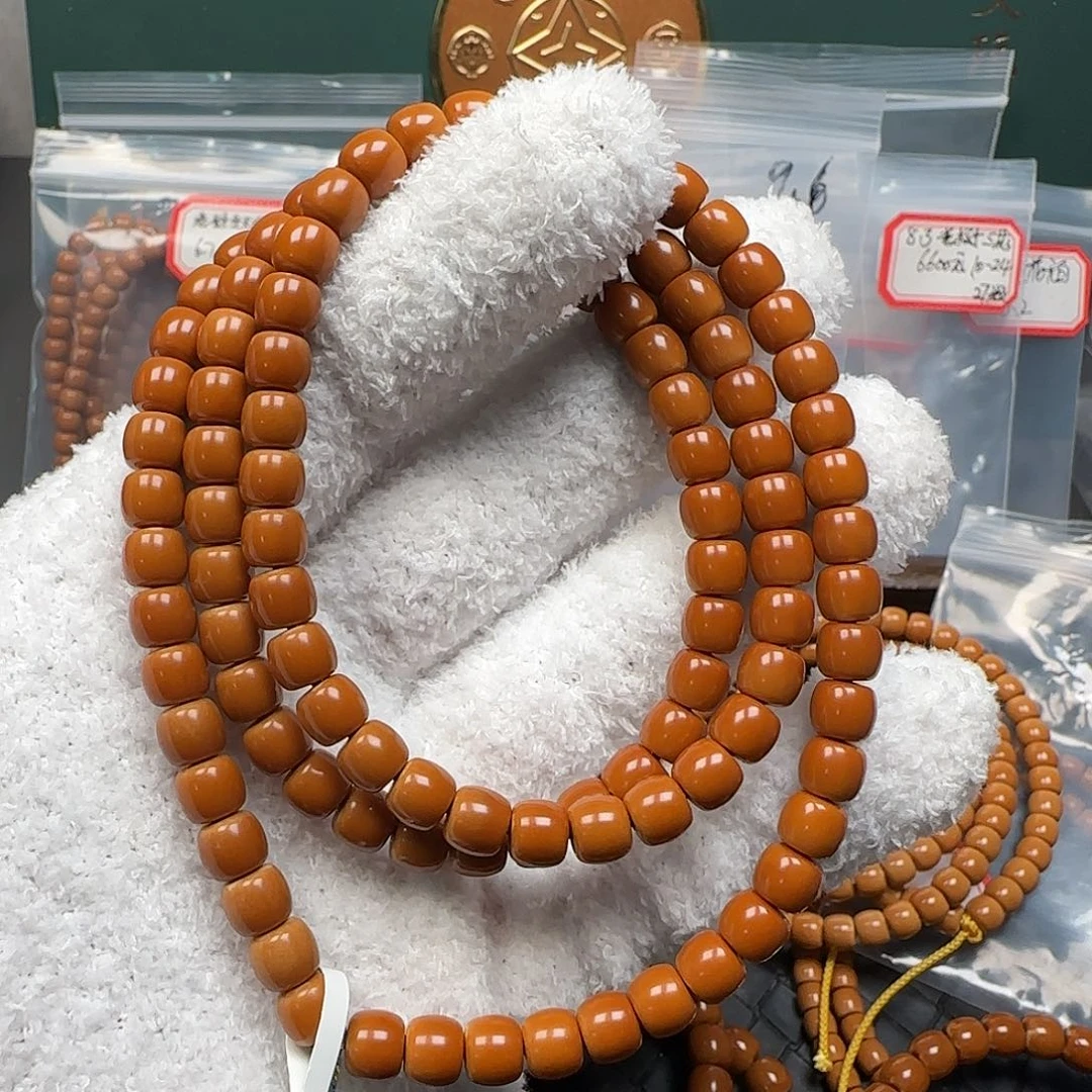 晓***冬橄榄核吊坠7.3mm老挝核尖极限弧108