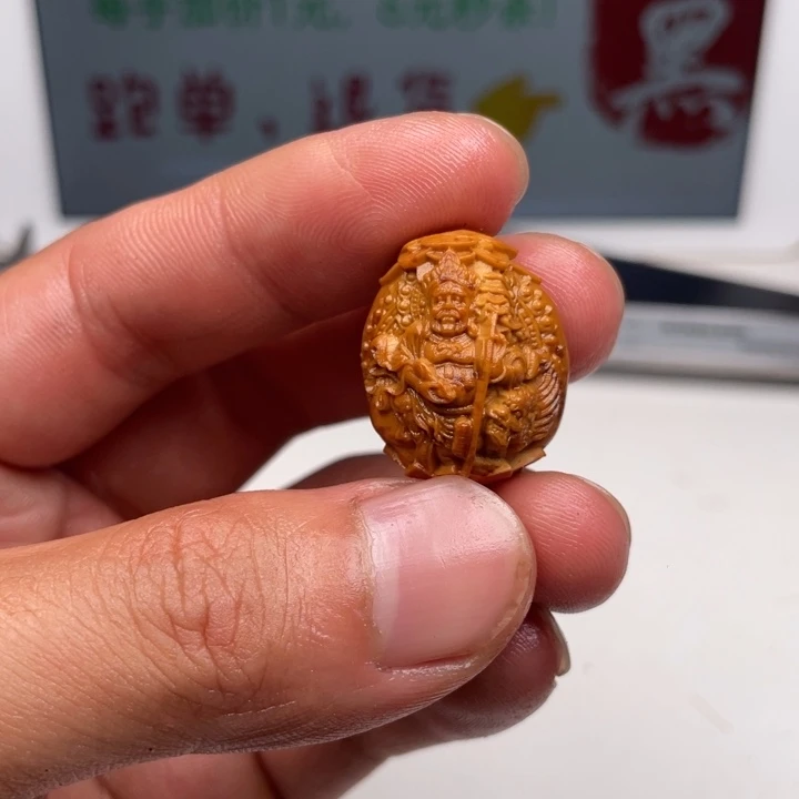 橄榄核吊坠橄榄核雕刻单子。