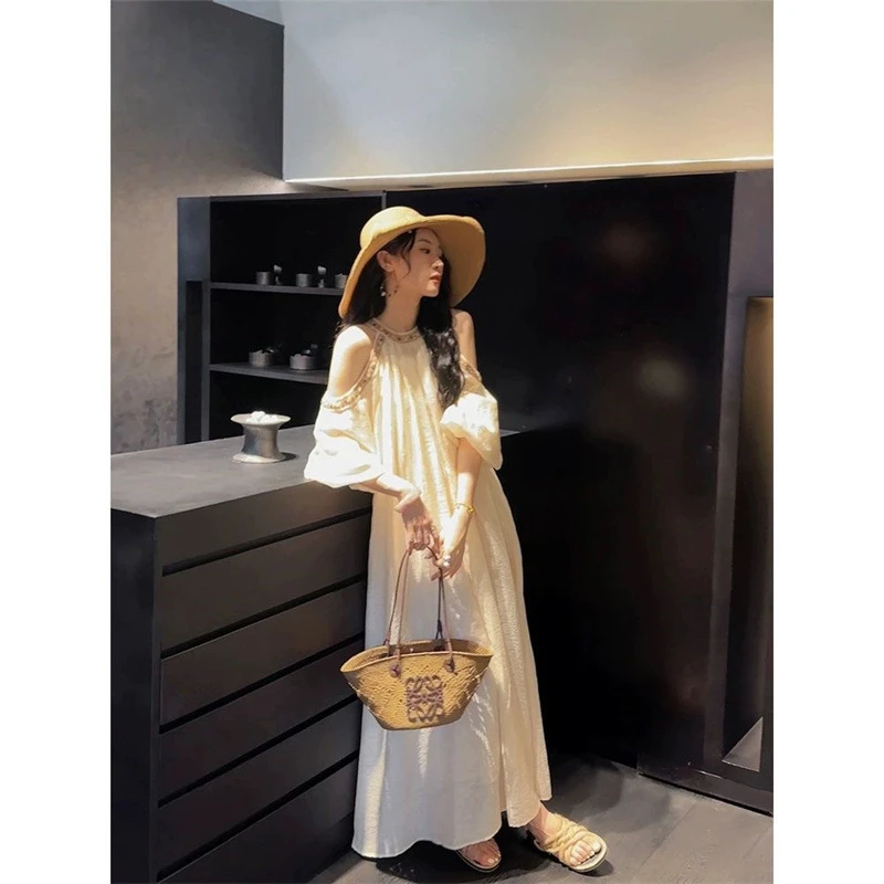 2025新款法式高级灯笼袖中长连衣裙超仙海滩度假温柔风洋气显瘦宽