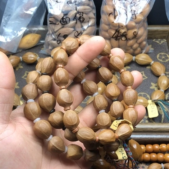 摘***落吊坠橄榄核来来咯哦一组图