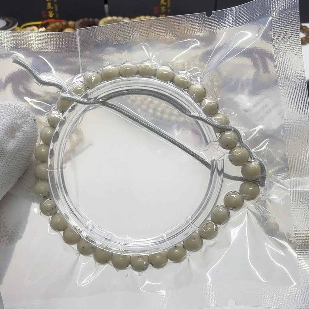 星月菩提吊坠25梵天冰白通体龙蛋7圆手持一物一图