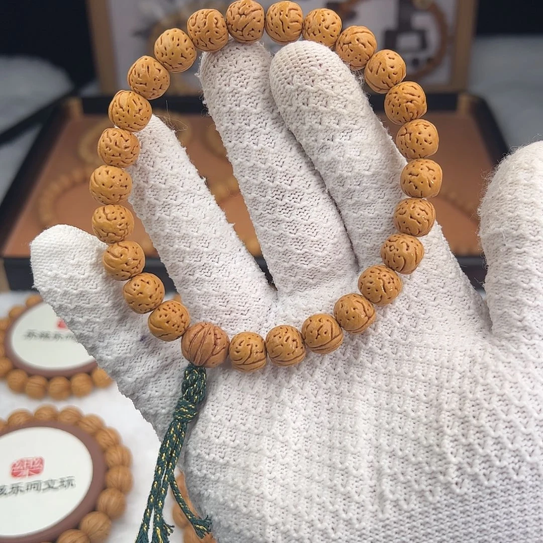 用***9桃核手串1.1加「金蝉子」野生桃核手持