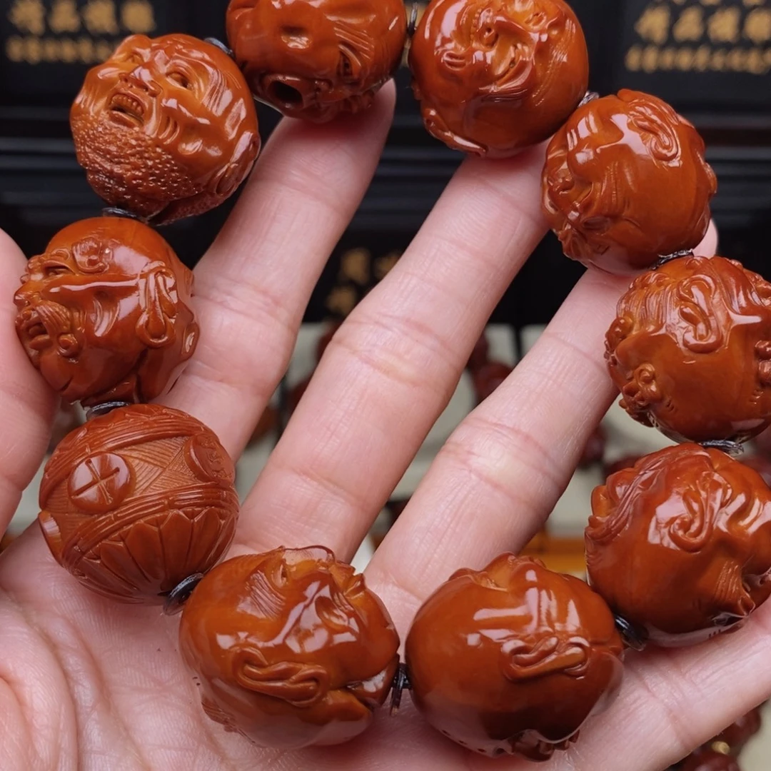江***捷橄榄核吊坠十八罗汉