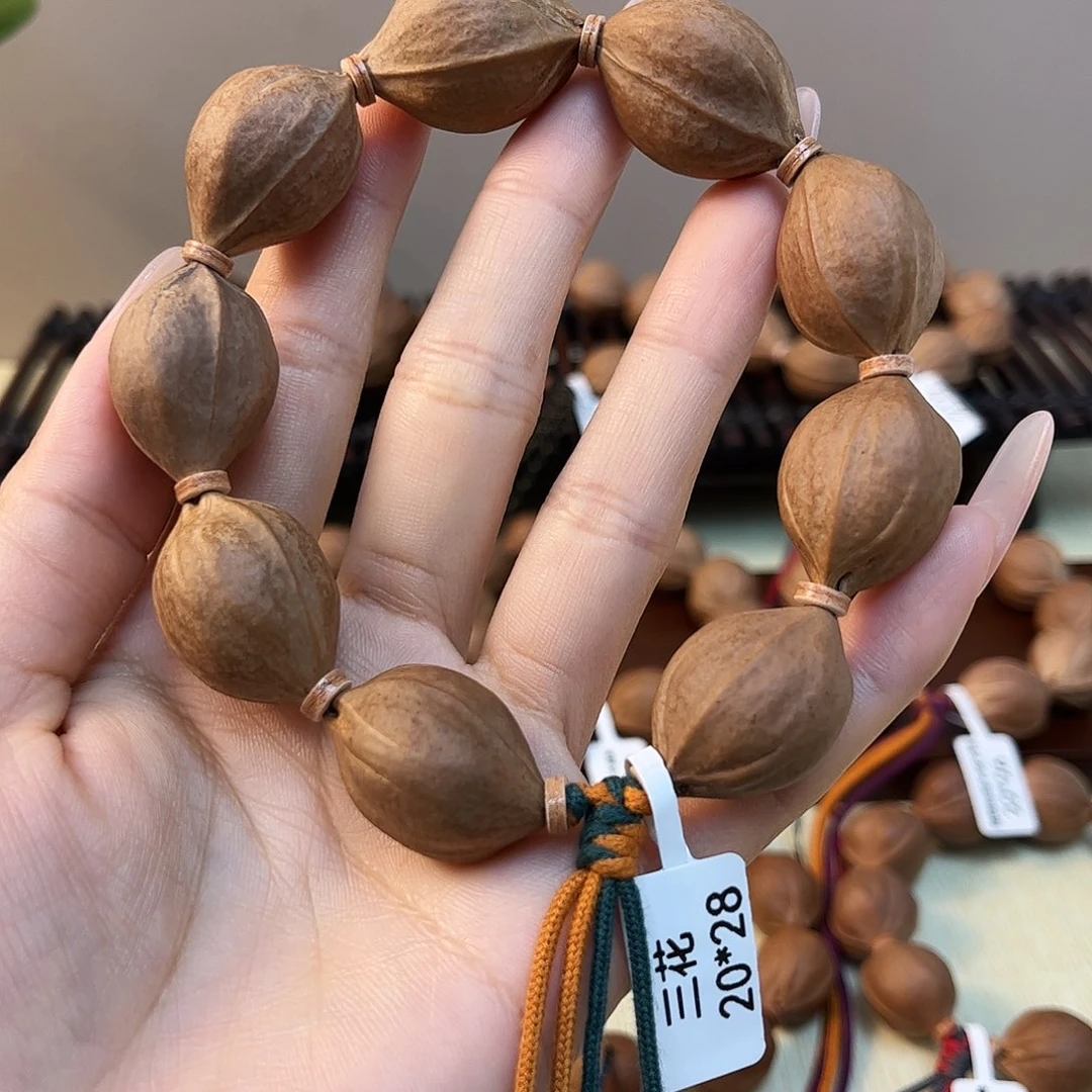 蝰***吊坠橄榄核梅林铁核文玩手串