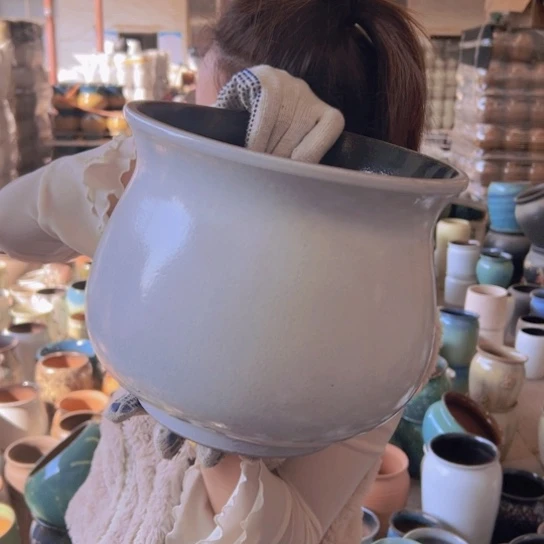 紫砂花盆高22口25。